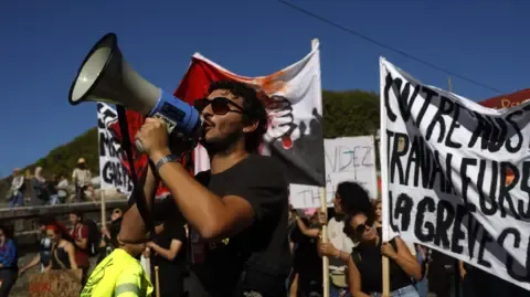 Countrywide Protests Break Out Against Fiscal Reductions